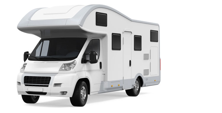 Die ERGO Reiseversicherung Campingfahrzeugversicherung schützt das weiße Wohnmobil
